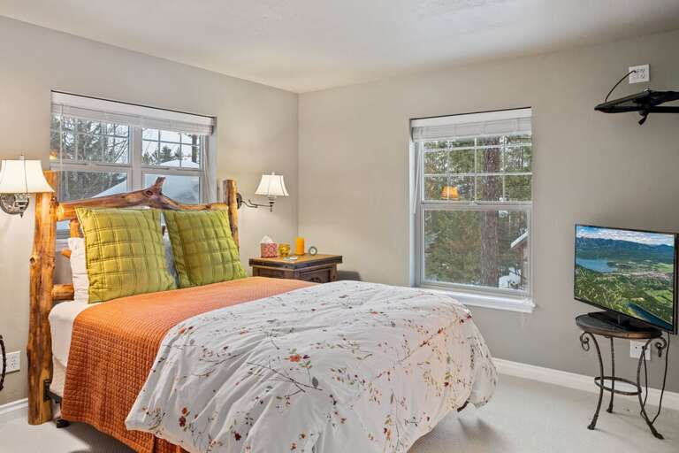 Upper Level Bedroom 2 with a Queen Bed and TV