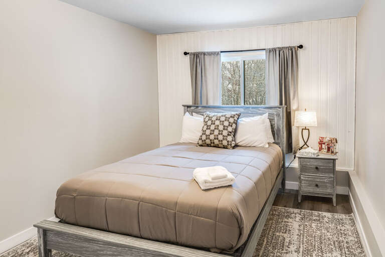 Bedroom 2 with a Queen Bed | Main Level Bedroom 2 with a Queen Bed | Main Level