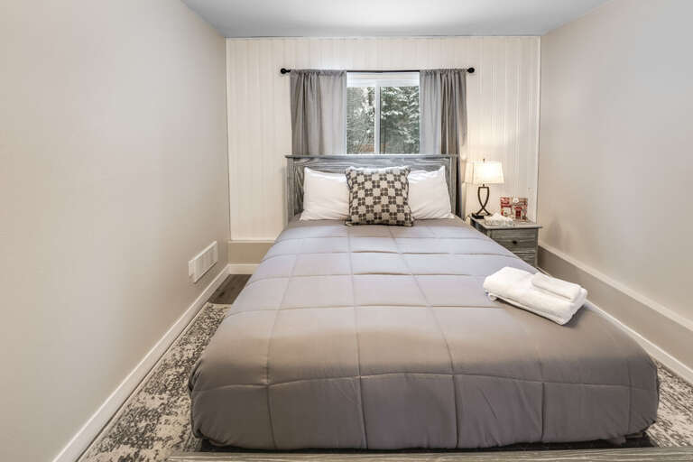 Bedroom 2 with a Queen Bed | Main Level Bedroom 2 with a Queen Bed | Main Level