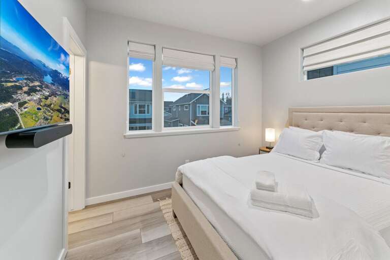 Master bedroom 1 with a plush, high-end king bed & Samsung 43" OLED Smart TV with Sonos sound bar | Upper Level Master bedroom 1 with a plush, high-end king bed & Samsung 43" OLED Smart TV with Sonos sound bar | Upper Level