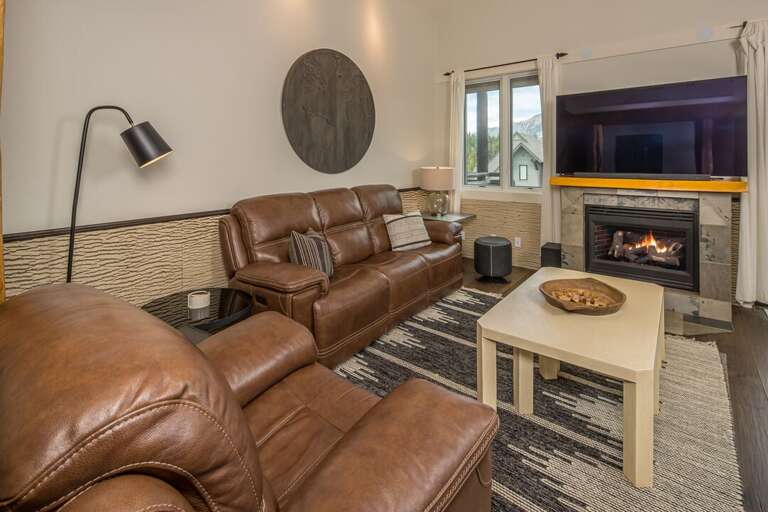 Cozy living room to relax by the fire | Main Level