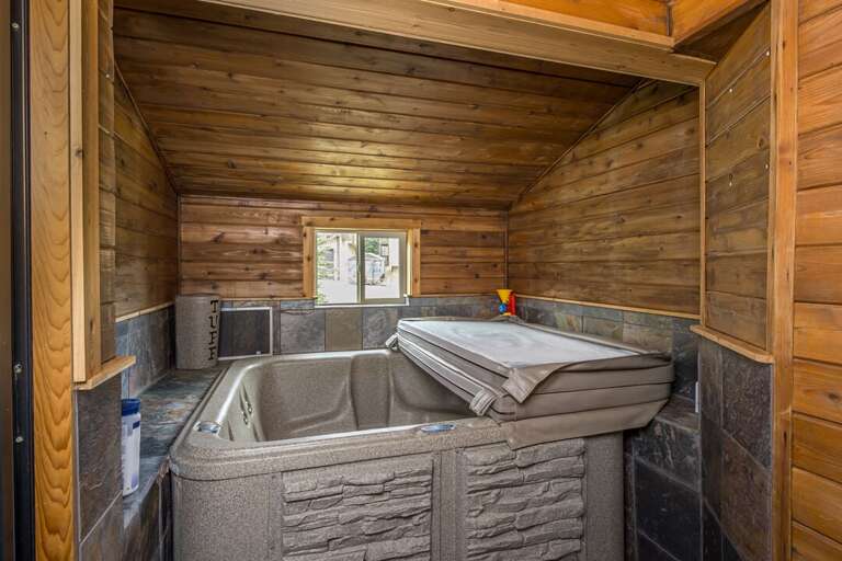 Hot tub attached to primary bedroom