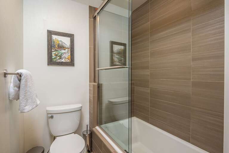 Full bathroom with shower/tub combo | Upper Level
