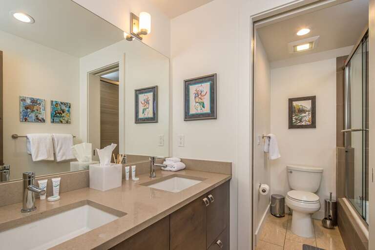 Shared third full bathroom | Upper Level