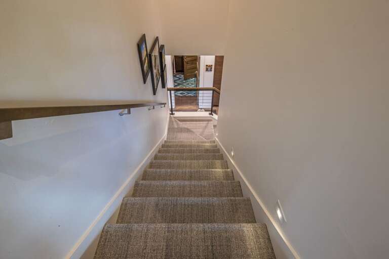 Stairs connecting upper and lower level