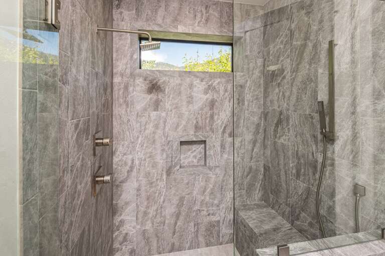This beautiful walk-in shower includes a rain shower head with an additional detachable shower head! This beautiful walk-in shower includes a rain shower head with an additional detachable shower head!