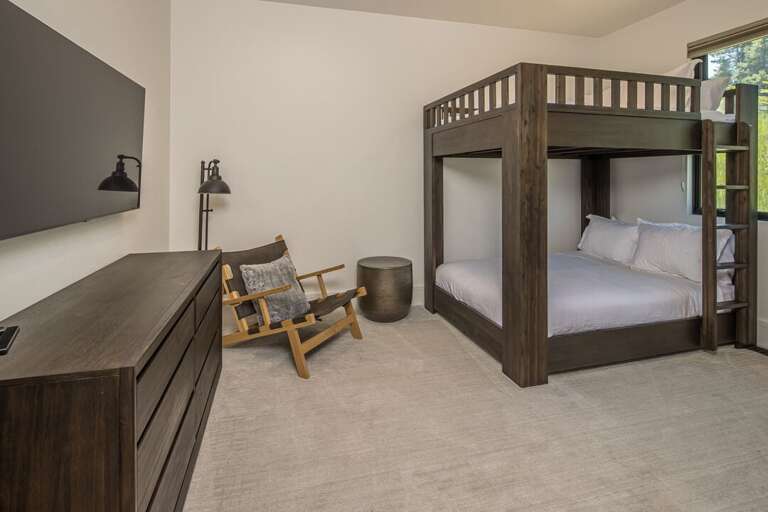 Full sized bunk beds with smart TV! Full sized bunk beds with smart TV!