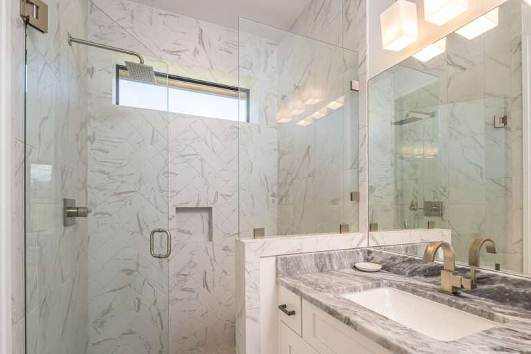 Walk - in shower with one sink vanity attached to bedroom Two! Walk - in shower with one sink vanity attached to bedroom Two!