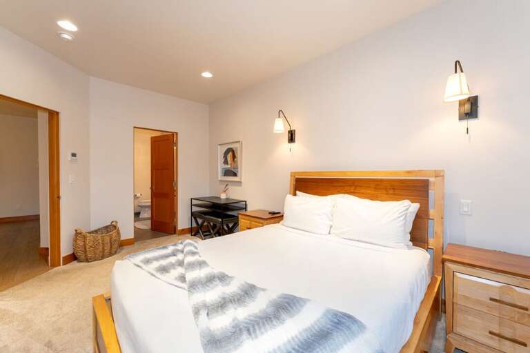 Bedroom featuring an ensuite bathroom.