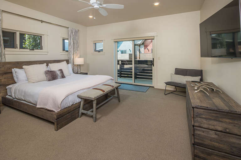 TV and access to the balcony making a perfect getaway | Upper Level