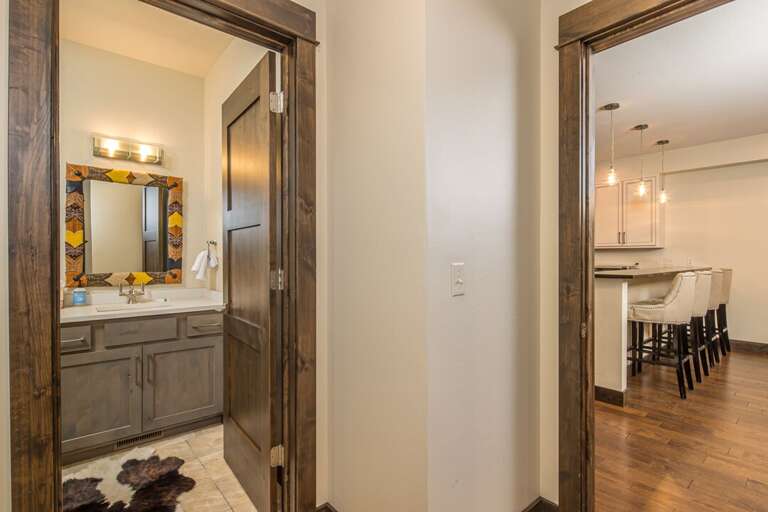 Half bathroom adjacent to the great room | Main Level