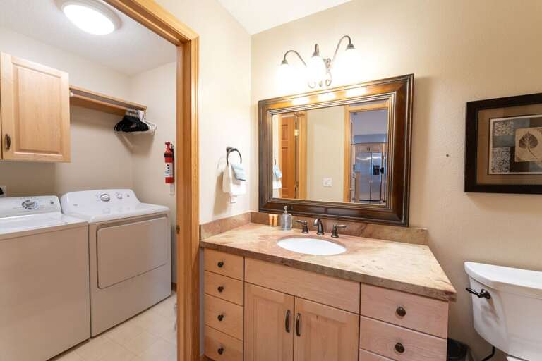 1/2 Bath connected to laundry room | Main Level 1/2 Bath connected to laundry room | Main Level