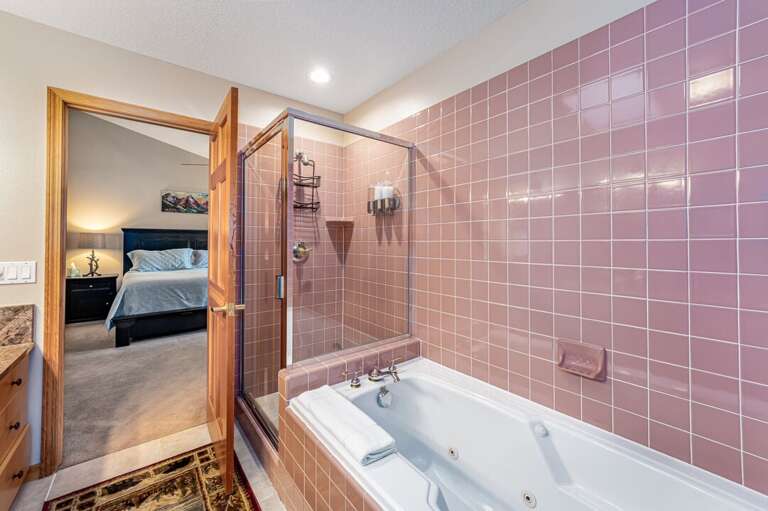 Primary Ensuite Bathroom with standing shower and a bath tub | Upper Level Primary Ensuite Bathroom with standing shower and a bath tub | Upper Level