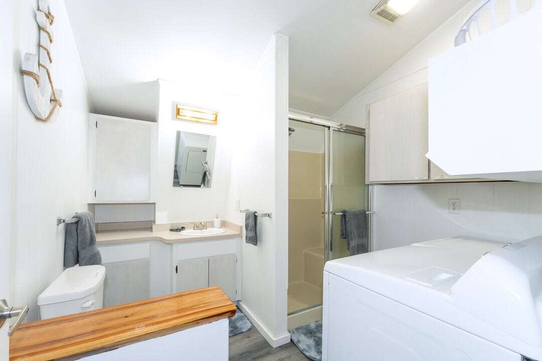 The bathroom includes a stand-up shower | Upper Level The bathroom includes a stand-up shower | Upper Level