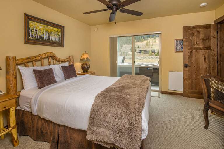 2nd bedroom has direct access to the patio with a hot tub right outside the door | Main Level