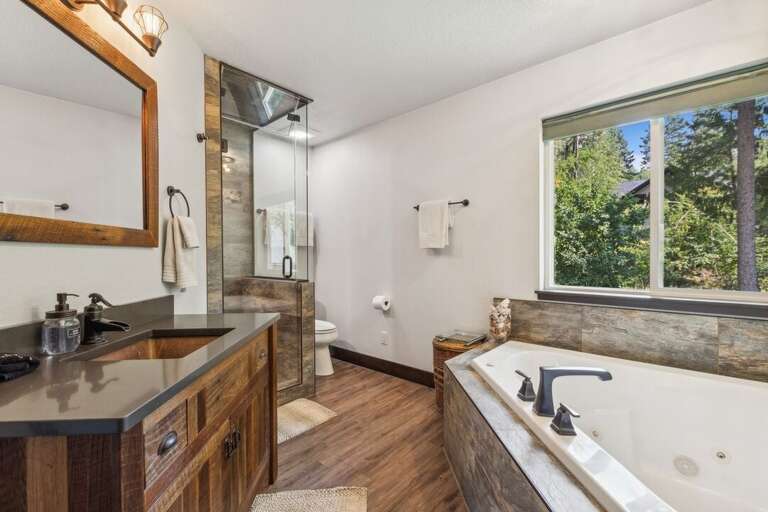 Large windows offering natural lighting while getting ready for your next adventure. | Upper Level