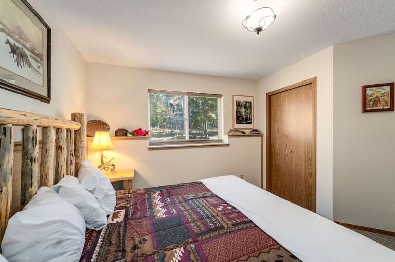 Peaceful forest views through a large window. | Lower Level