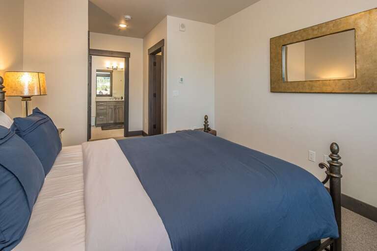 The second bedroom also having a king-size bed and ensuite bathroom. | Main Level
