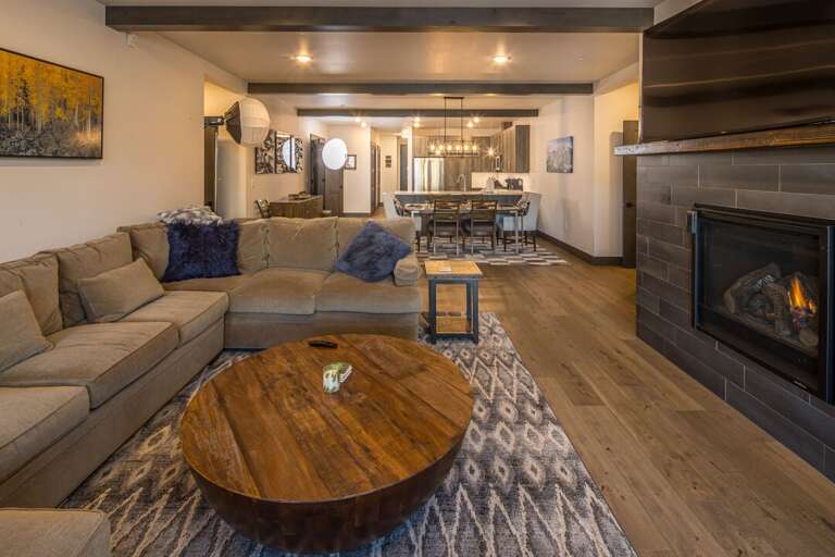 An open layout allows for your whole group to enjoy one another, whether you are cooking, relaxing, or playing cards at the dining table! | Main Level