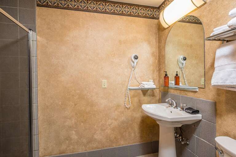 Second bathroom includes a stand-up shower | Main Level