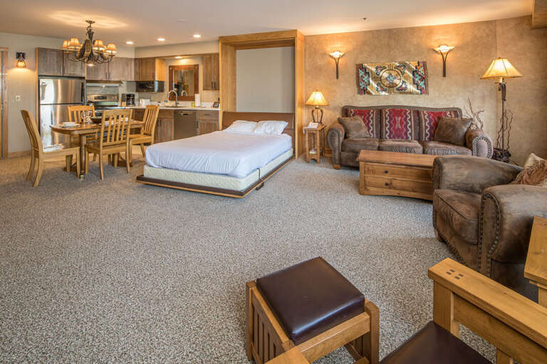 The great room easily transitions into a relaxing bedroom with a Murphy bed | Main Level