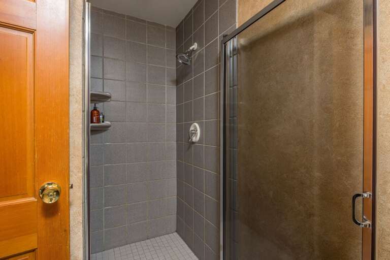 Walk-in shower in shared bathroom | Main Level