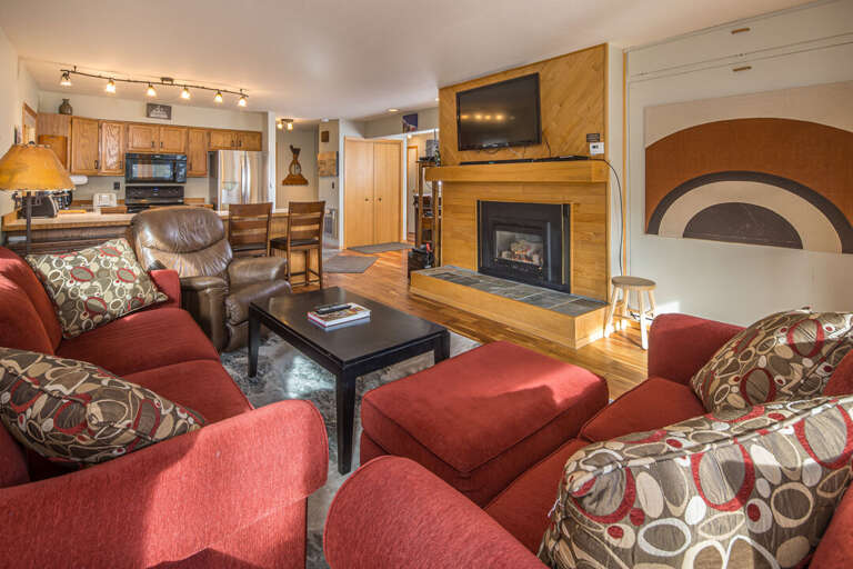 Ample cozy seating in the living room to unwind after a day on the slopes | Main Level