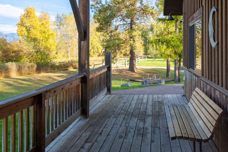 Enjoy a morning cup of coffee while looking at the foliage in the yard.
