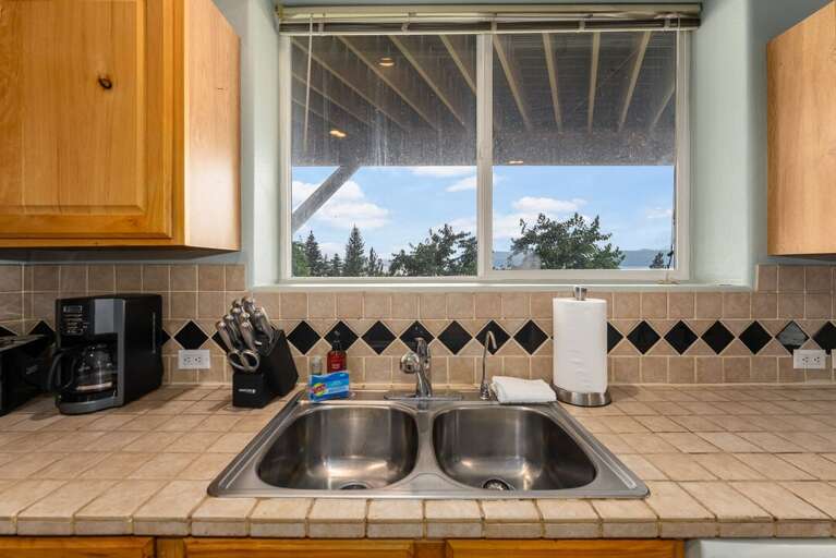 Sink with lake views. | Lower Level