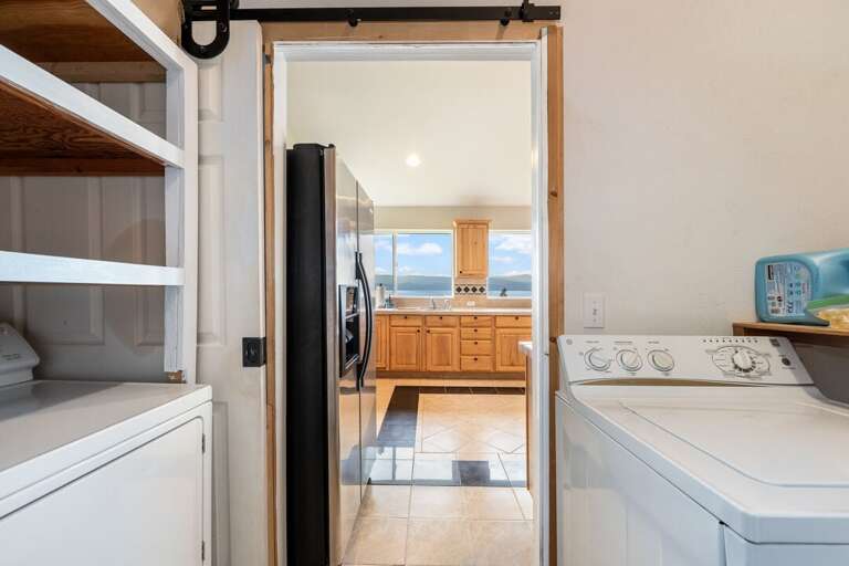 Washer and dryer off the kitchen. | Main Level