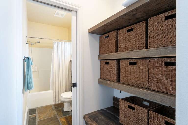 Ensuite bathroom with plenty of storage.