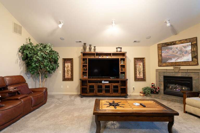 Watch your favorite movie and warm up with the fireplace.