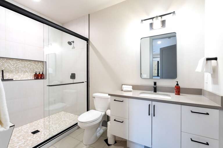 Ensuite bathroom with walk-in shower. | Upper Level