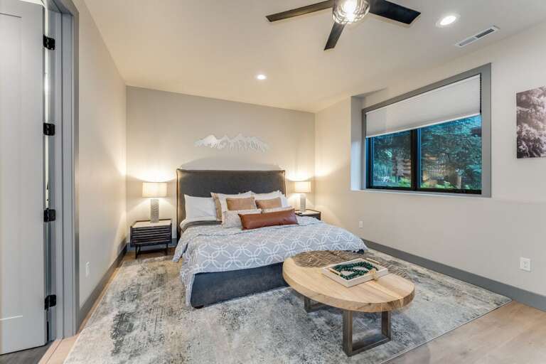 Primary bedroom with coffee table | Main Level