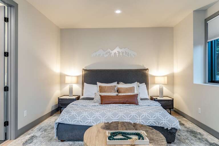 Primary bedroom with king bed | Main Level