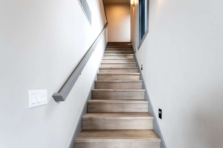 Stairs to upper level. | Main Level