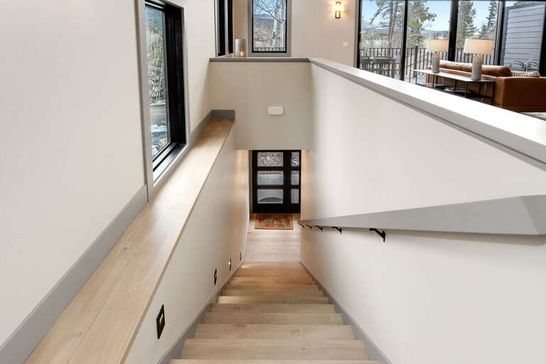 Stairway to main level. | Main Level