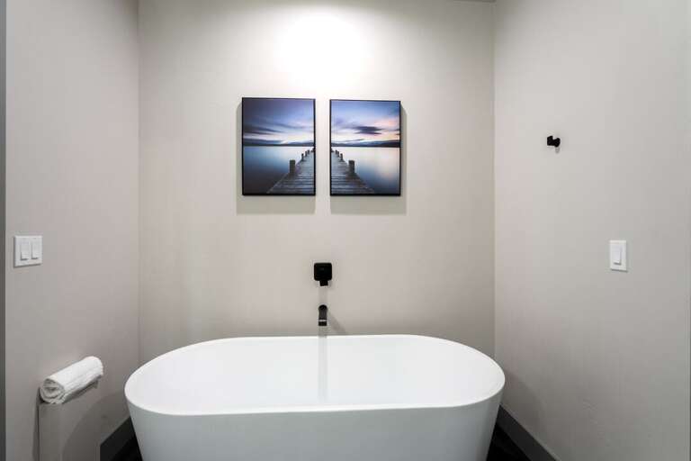 Stand alone tub to relax in. | Main Level