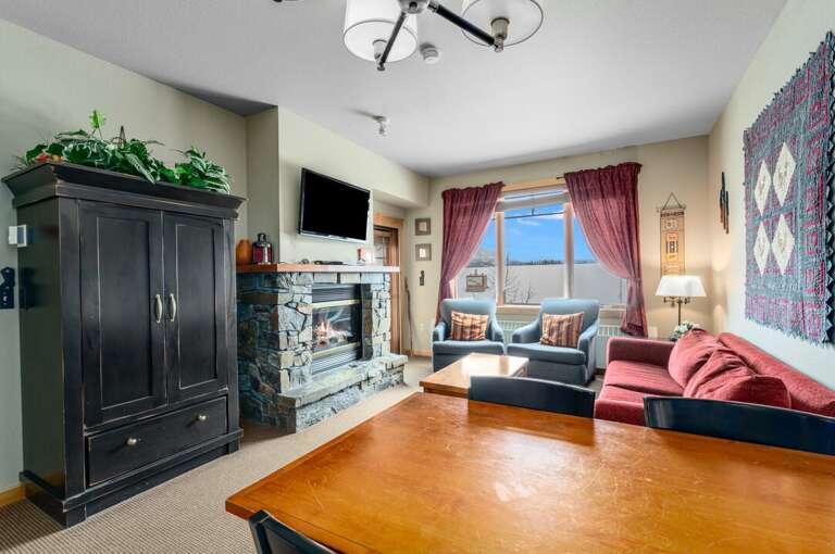 Living room with gas fireplace.
