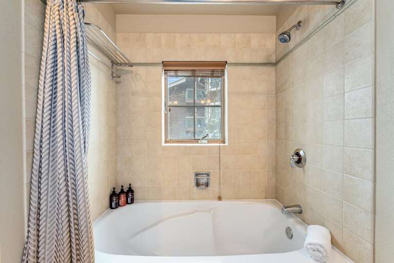 Shower/tub combo.