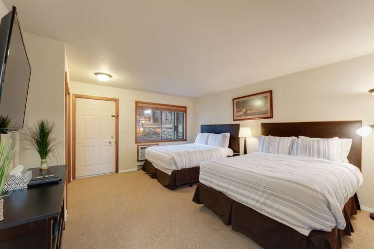 Second bedroom with 2 queen size beds. | Main Level