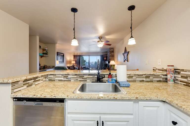 Counter space to prepare your meals while enjoying your company and the views! | Main Level