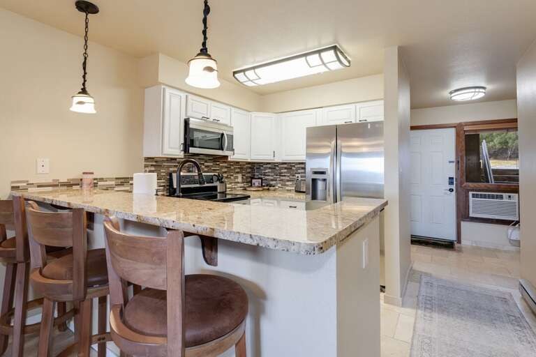 Island and kitchen. | Main Level