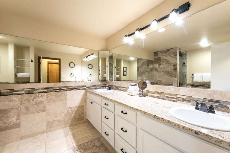 Primary bathroom with plenty of room to get ready. | Main Level