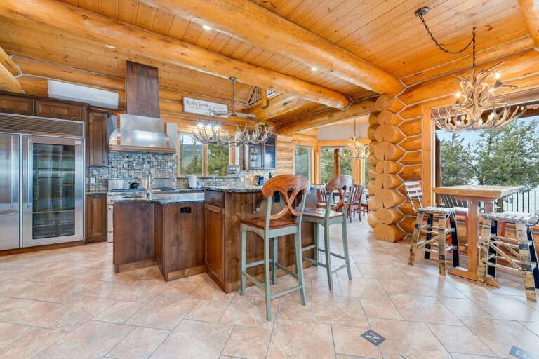Wide view of the kitchen and dining room seating | Interior