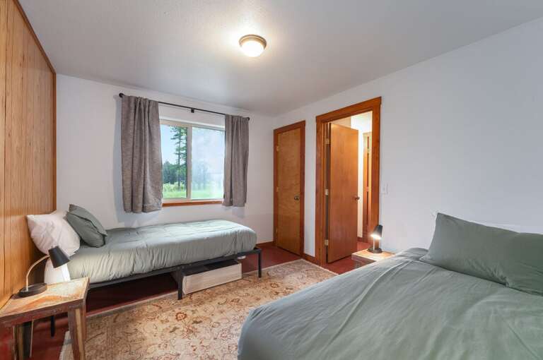 Downstairs bedroom with two double beds | Interior