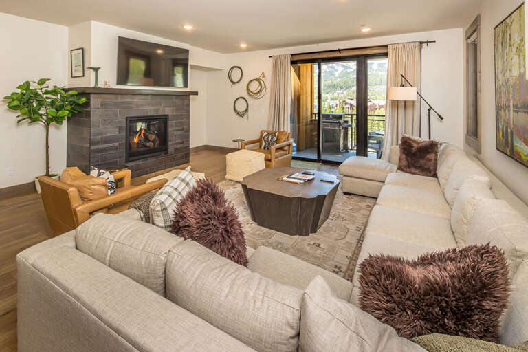 Ample seating in the Living room with mountain views | Main Level