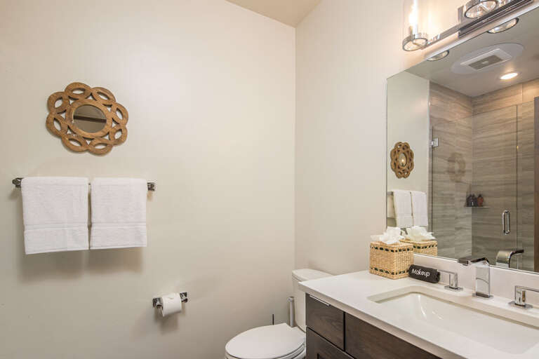 Bathroom with vanity and glass shower | Main Level