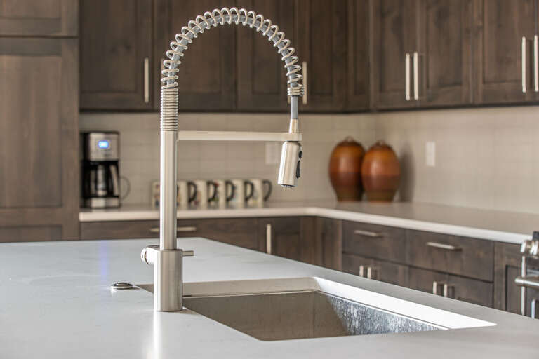 Kitchen with sleek faucet I Main Level