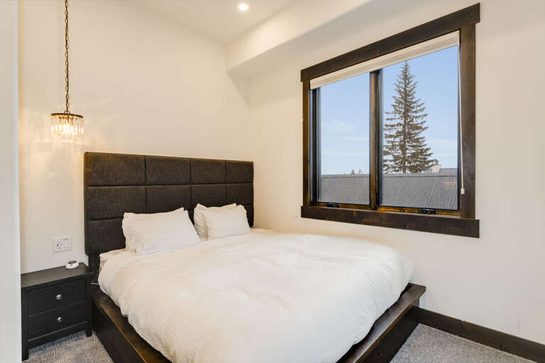 King size bed. | Main Level